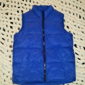 Old Navy Boys puffer vest. Blue fleece lined, zip up with side pockets. Like new